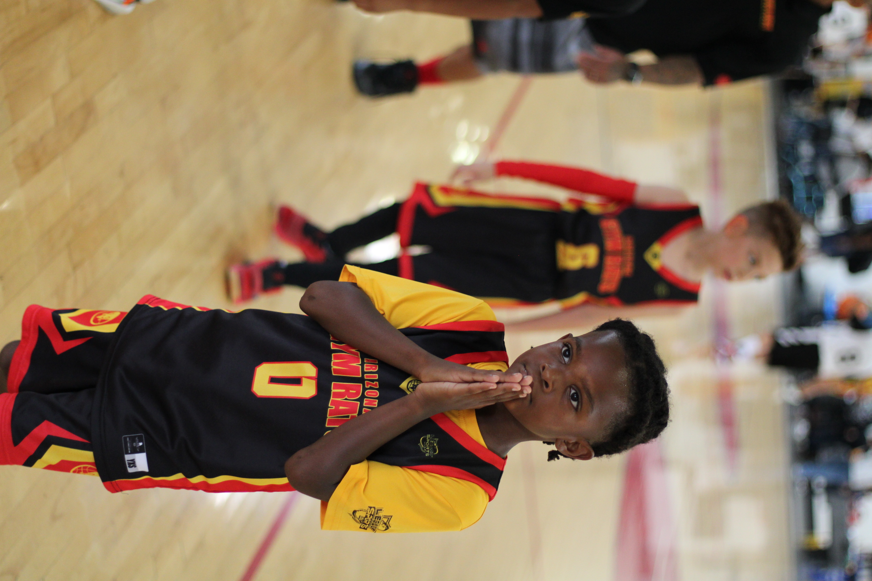 Young basketball player focused during a game